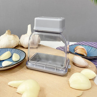 Manual Garlic Press and Grater - Kitchen Tool for Efficient Garlic Peeling and Grinding