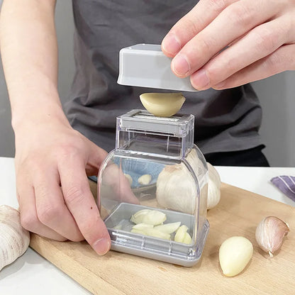 Manual Garlic Press and Grater - Kitchen Tool for Efficient Garlic Peeling and Grinding